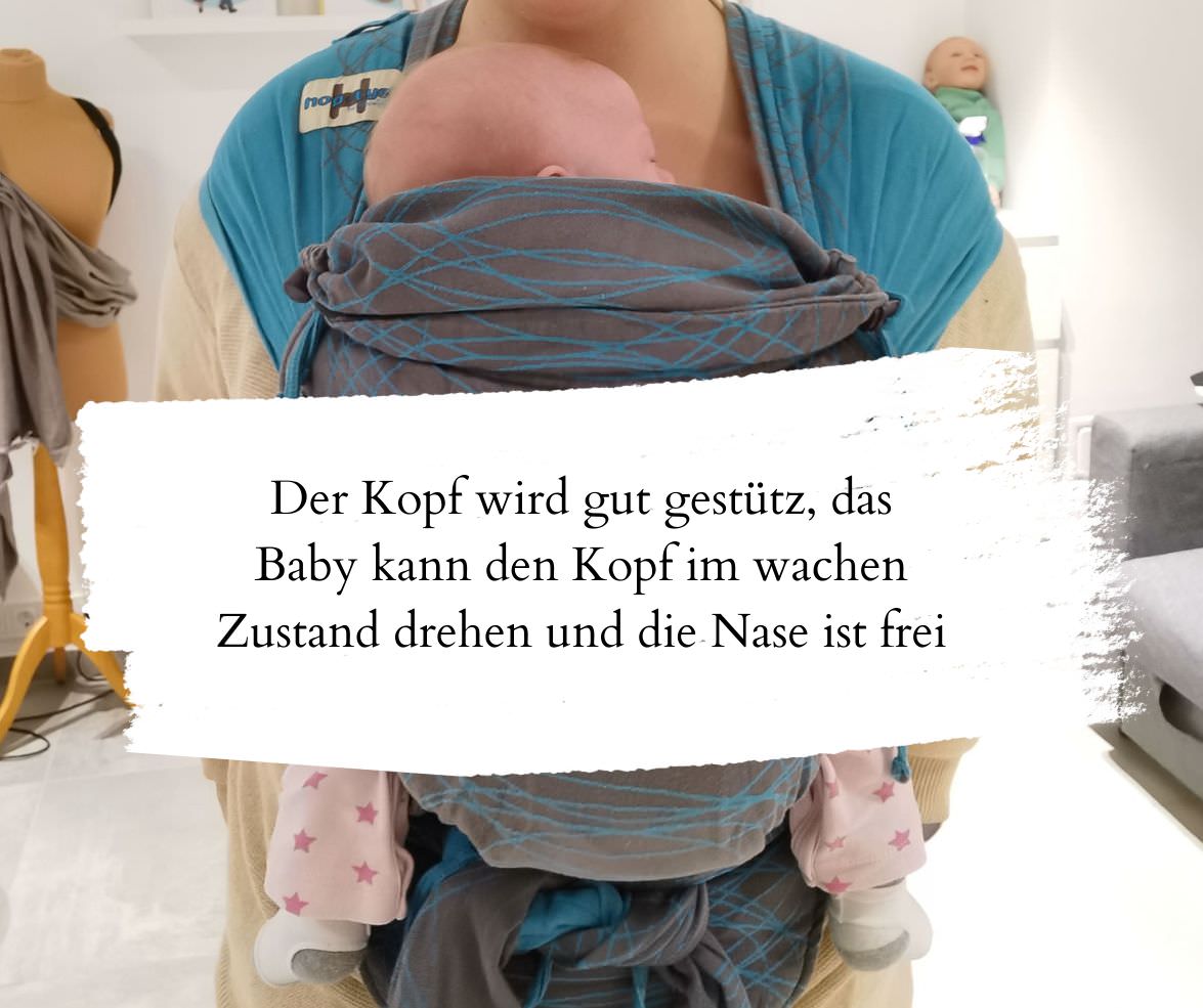 Korrekt eingestellte Babytrage mit Baby das freie Atemwege hat